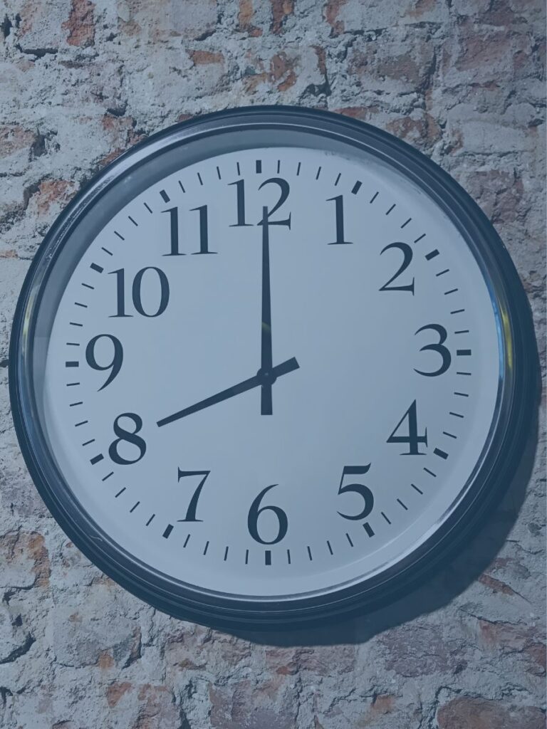 Clock on wall at 8 oclock.