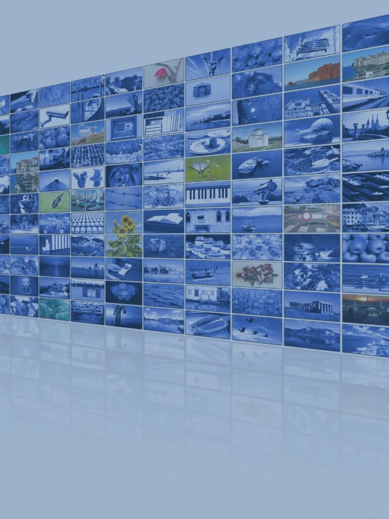 Large screen with multiple video screens.